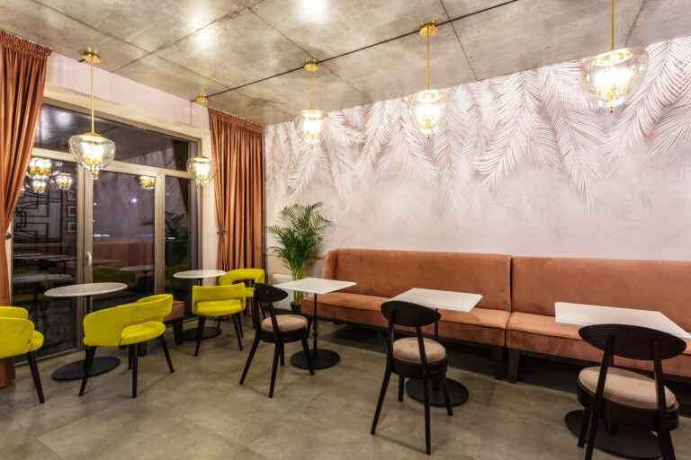Café interior with sofa seating and pendant lights